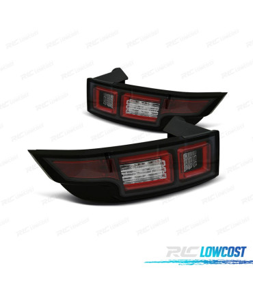 FAROLINS TRASEIROS RANGE ROVER EVOQUE 11-15 LIGHT BAR FUNDO PRETO FUMADO